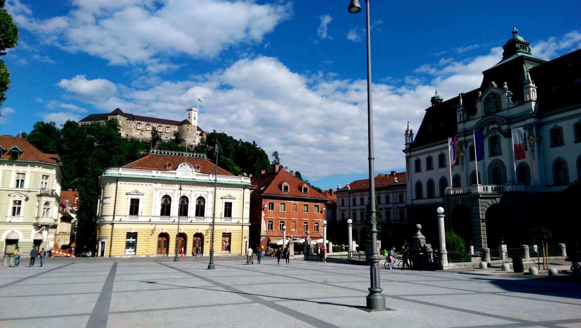 Congress Square (Kongresni trg) in Ljubljana with its grand facades and the castle hill behind